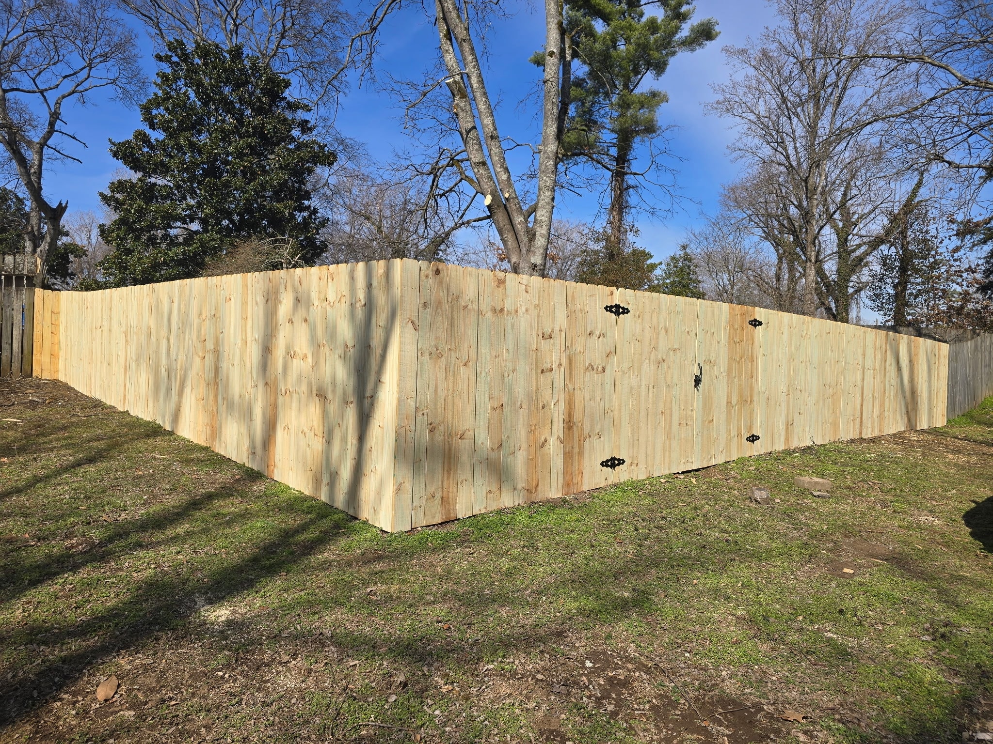 Heavy equipment positioned for a residential tree-removal project